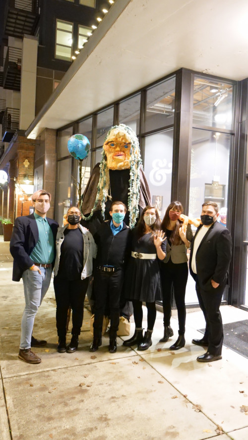 Mary Andrus (back center, in Mother Earth costume), co-chair of Art for Social Change, and cast members of the Climate Theatre Action pla...