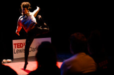 Young alumnus LaTroy Robinson BA '18 performing on stage at TEDxLewisandClarkCollege.
