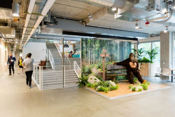 Interior of Meta offices showing a display of Sasquatch sitting on a bench.