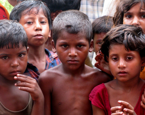Vrindavan children at food distribution in flooded area