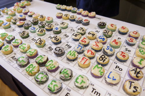A periodic table of the elements as cupcakes at the 2022 Festival of Scholars and Artists.