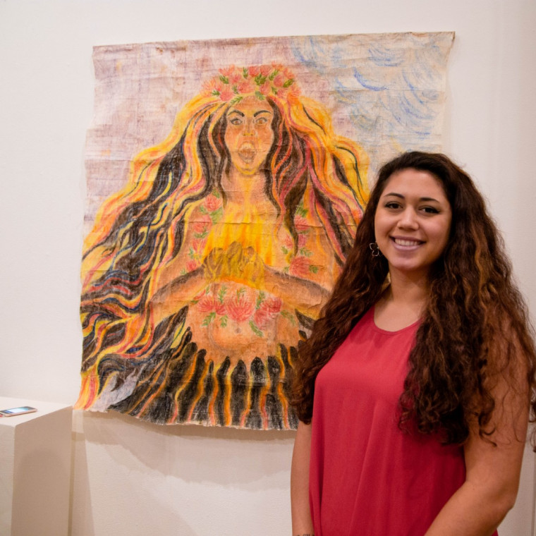 Brigitte Russo '15 with her depiction of Pele, the ancient Hawaiian fire goddess.