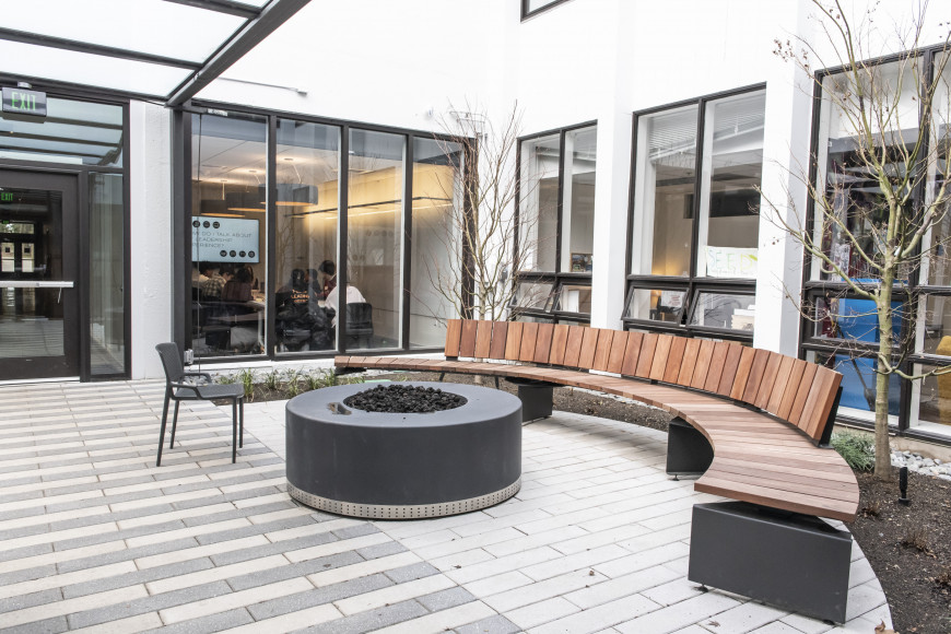 This outdoor area has become a central pathway through the building and serves as a hub for outdoor gatherings. 