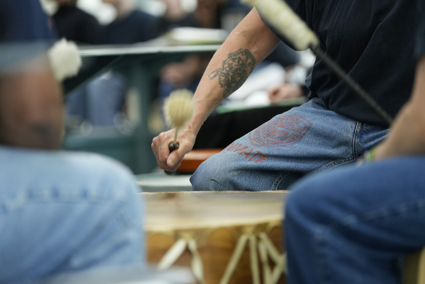Close up shot of an inside student drumming.