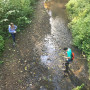 Two students taking measurements in Tryon Creek.