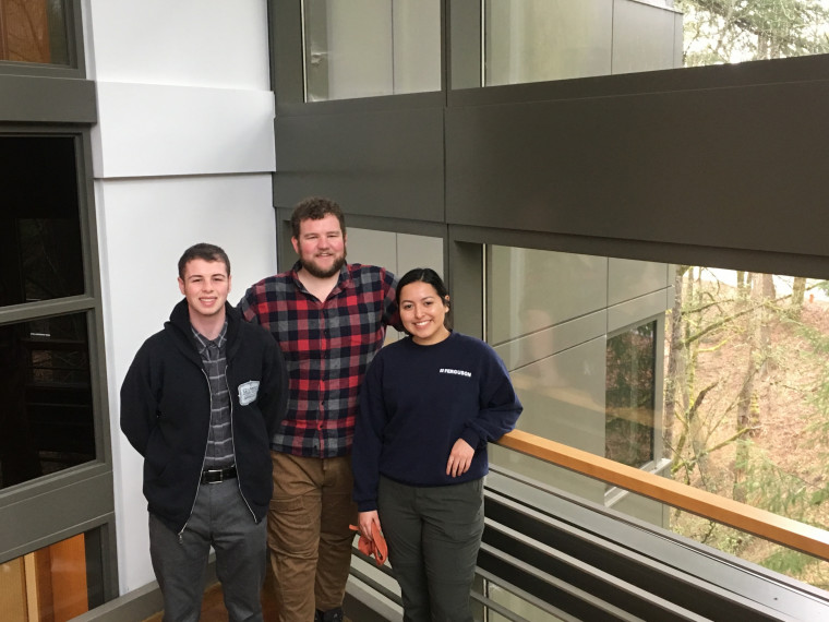 Wyss Scholar Cooper Rodgers '19 (center) with students Maya Alvear and Thomas Premo.